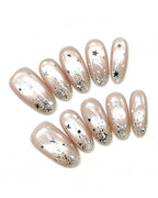 Celestial Star Press On Nails - Sheer Shimmer Nude Almond Nails with Starburst Art