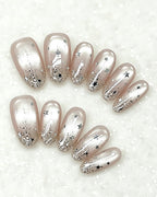 Celestial Star Press On Nails - Sheer Shimmer Nude Almond Nails with Starburst Art
