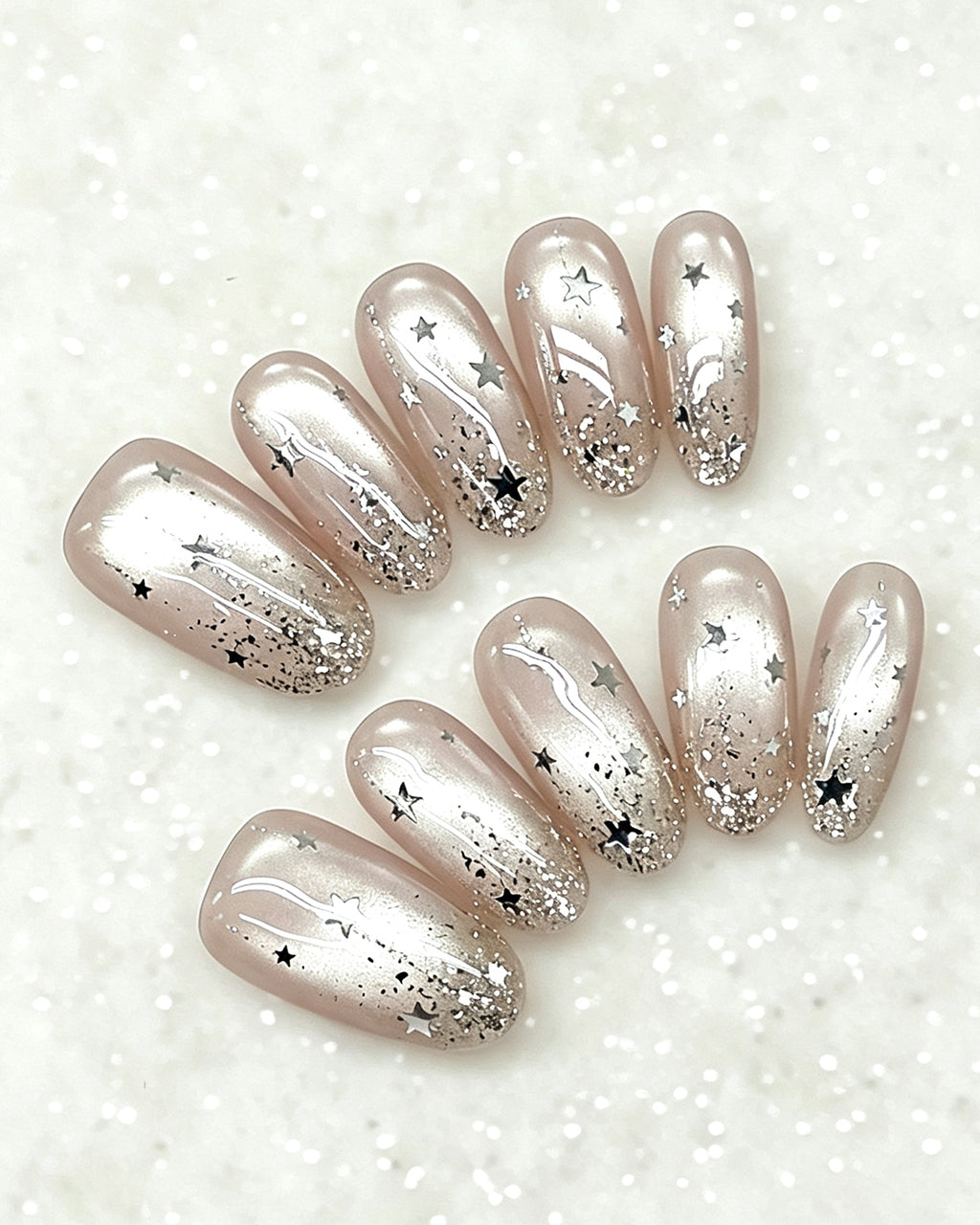 Celestial Star Press On Nails - Sheer Shimmer Nude Almond Nails with Starburst Art