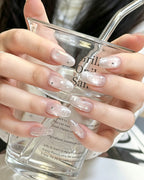 Celestial Star Press On Nails - Sheer Shimmer Nude Almond Nails with Starburst Art